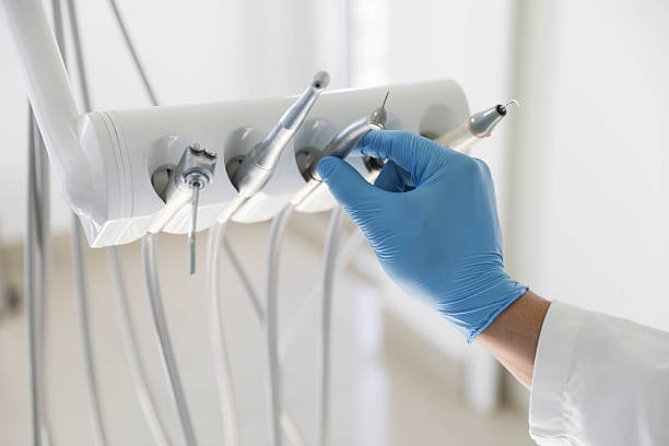 Professional Invisalign Clear Aligners technician working in Grafton, ND